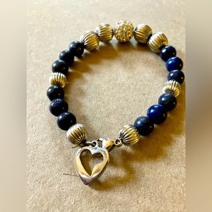 Silver tone as navy beaded rhinestone bracelet with heart charm